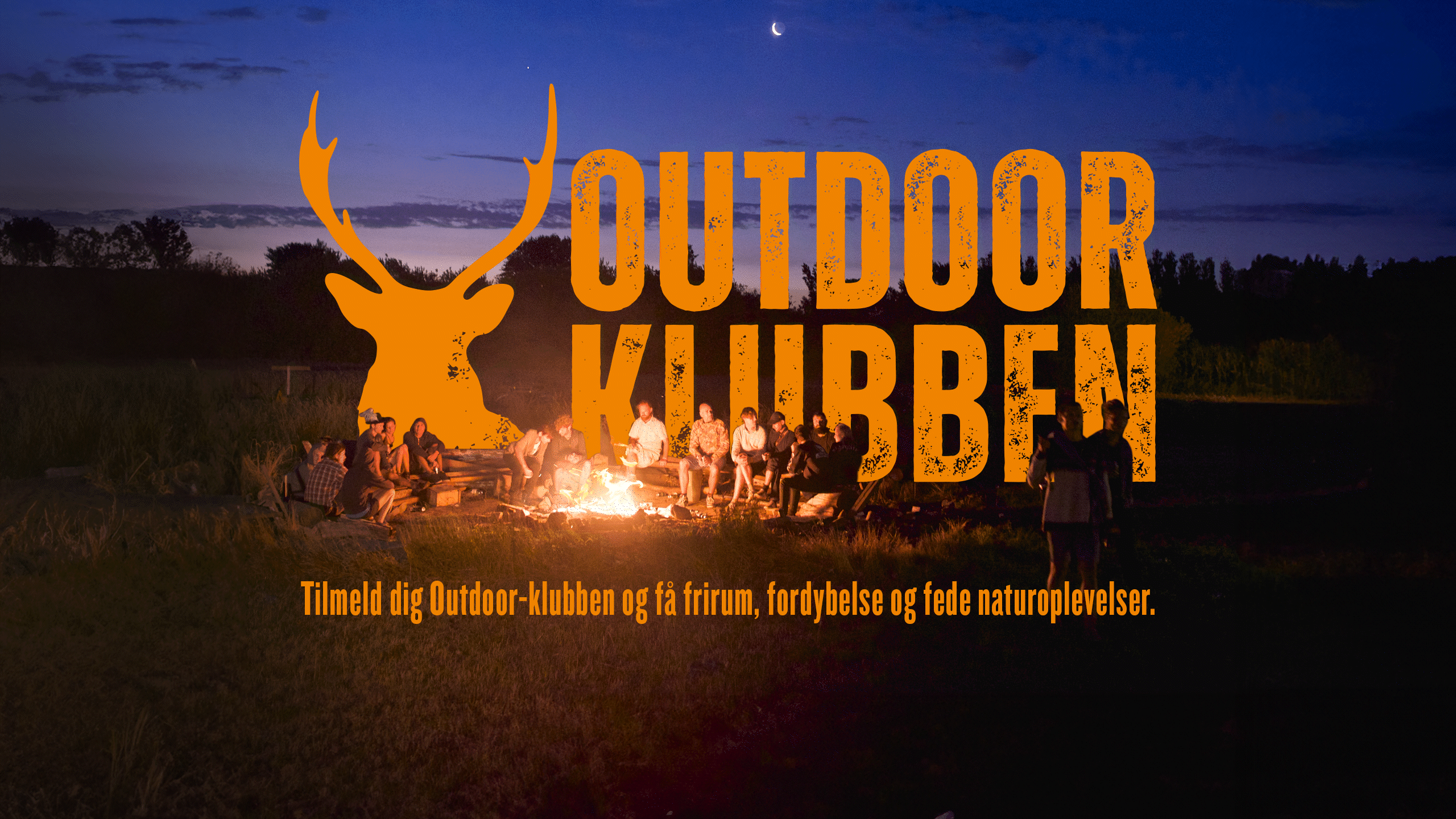 Lejerbål med levende ild og Outdoor klubbens logo